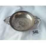 A bowl with two cast handles on rim foot, 5" over handle. London 1919 88gms.