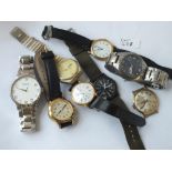 A bag of assorted getns wrist watches