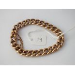 A GOOD CURB LINK BRACELET in 10 ct - 20gms