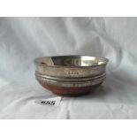 A mazer of 16th Century design with turned wood base, 4.5" dia. Sheffield 1912 by TB & S