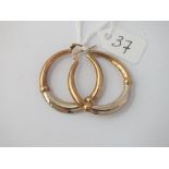 A pair of large two colour gold hoop earrings in 9 ct - 4.3gms.