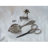 An ornate cast spoon 1895 and two other items