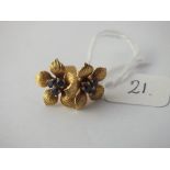 A pair of gold and sapphire floral ear studs - 4.2gms