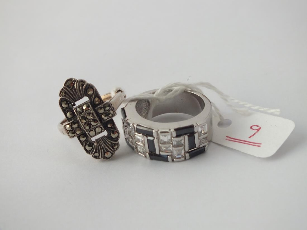 An Art Deco silver and marcasite ring and one other dress ring