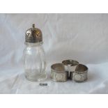 A silver mounted caster, a pair of napkin rings