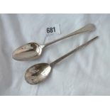 A hammered spoon by M & W and a Georgian bottom mark spoon. 62gms.