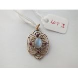 A moonstone and ruby five stone pendant set in 9 ct - 1.6gms