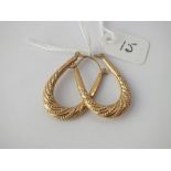 A pair of fancy hoop earrings in 9 ct - 1.9gms.