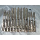 A set of six Kings pattern fruit knives and forks with engraved blades and prongs. Sheffield 1887 by