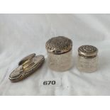 Two embossed top jars and a nail buffer