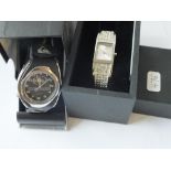 A gents Quik silver wrist watch & a Next wrist watch as new