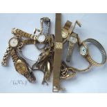 A bag of 14 ladies gilt & other wrist watches