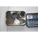 Tin of old coins