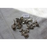 A silver charm bracelet - 28gms