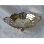 A good silver gilt oval shaped fruit stand with cast edge and pierced panels, 11.5" wide. London