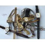 A bag of assorted ladies wrist watches