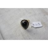 A DROP SHAPED VINTAGE GARNET & BLACK DIAMOND SET RING IN 28CT GOLD - size M - 9.2gms