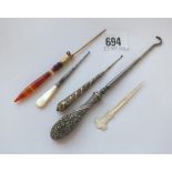 A late Victorian button hook and four other items