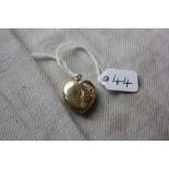 A heart shaped back & front locket in 9ct - 3.5gms