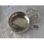 A continental silver (800 standard) plain bleeding bowl with pierced handle, 5" over handle.