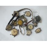 A bag of assorted ladies & gents wrist watches