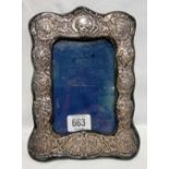 A SILVER MOUNTED PHOTO FRAME WITH ANGELS HEADS, BIRMINGHAM 1904 BY H.M