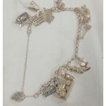 A SILVER BRACELET WITH 11 CHARMS