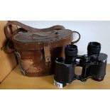 PAIR OF UNKNOWN POWER CCE IN A LEATHER CASE, MARKED CASE NO3 PRISMATIC BINOCULAR 1916