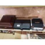 1 SMALL ALUMINIUM CD CARRY CASE, A RED WOOD WAT STORAGE DISPLAY BOX AND 1 OTHER