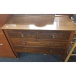 CHEST OF TWO SHORT AND TWO LONG DRAWERS ON WHEELS