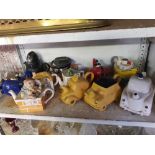 SHELF OF NOVELTY TEAPOTS BY CARLTON WARE AND OTHERS