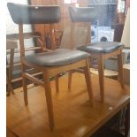 A PAIR OF SCHREIBER CHAIRS AND EXTENDING DINING TABLE