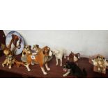 SHELF OF DOG FIGURES