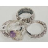 4 SILVER STONE SET RINGS