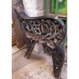 A PAIR OF VERY HEAVY CAST IRON BENCH ENDS