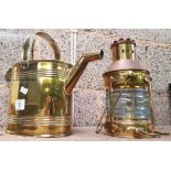 BRASS WATERING CAN BY ADAMS & SON, LONDON. AND MODERN BRASS AND COPPER OIL MAST HEADLIGHT