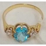 STUNNING 3 STONE BLUE TOPAZ 7 DIAMOND RING IN HIGH CARAT GOLD