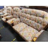 WOOD FRAMED SETTEE WITH MATCHING ARMCHAIR AND ROCKING CHAIR WITH FLORAL CUSHONS