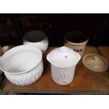 SHELF CONTAINING 2 CHINA OR STONE BREAD BINS, 1 STONE COLOURED, 1 WHITE AND 2 WHITE JARDINIERE VASES