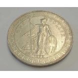 A silver trade dollar 1899 - good grade