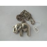 A silver elephant pendant on chain