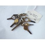 Seven assorted watch keys