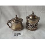 Two mustard pots, one with scroll handle - Birmingham 1920