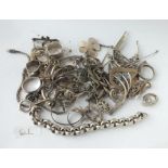 A bag of assorted silver items mainly bracelets, chains, pendants etc. - 290gms