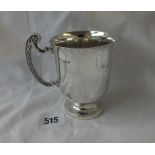 A Good quality christening mug with scroll handle - 3.75" high - London 1920 by M & W - 140 gms.