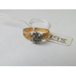 An emerald & diamond ring in 18ct gold - size O - 2.8gms