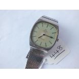 A gents OMEGA deville quartz wrist watch with calander dial & OMEGA strap