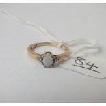 A opal & diamond ring in 14ct gold - size J/K - 1.6gms