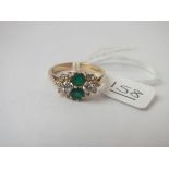 A emerald & white stone dress ring in 9ct - size O - 3.2gms