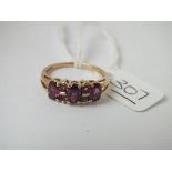 A purple & pink stone dress ring in 9ct - size P - 2.7gms